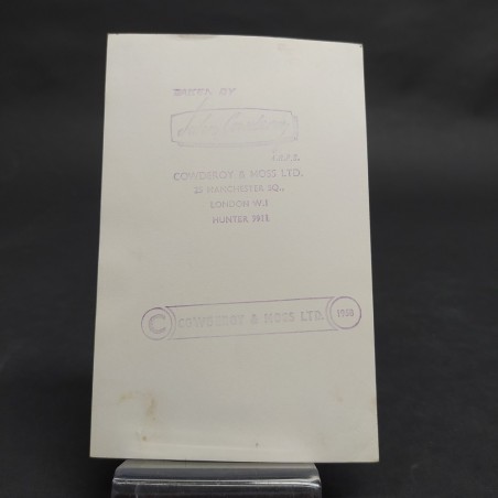 Fotografia del pilota di F1 Stirling Moss con autografo. Condizioni discrete