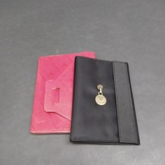 Portafoglio nero con marchio Tonino Lamborghini in confezione originale. Buono