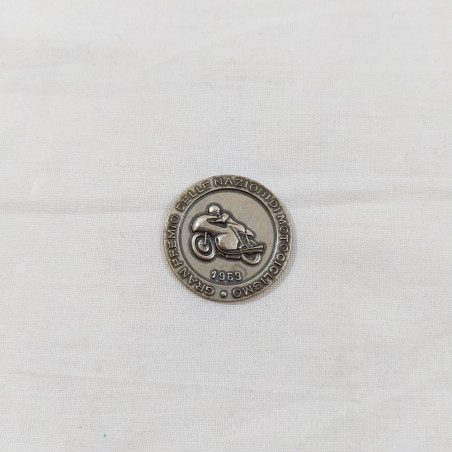 Lotto di 2 portachiavi e 3 medaglie tema motociclismo anni 70/80