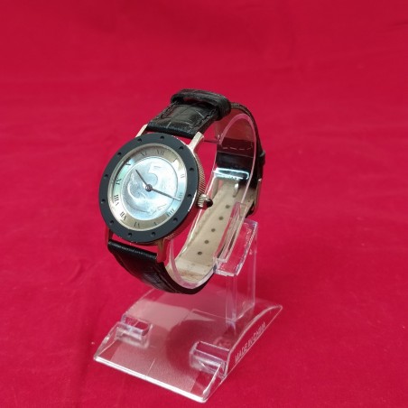 Orologio con store moneta 50 lire